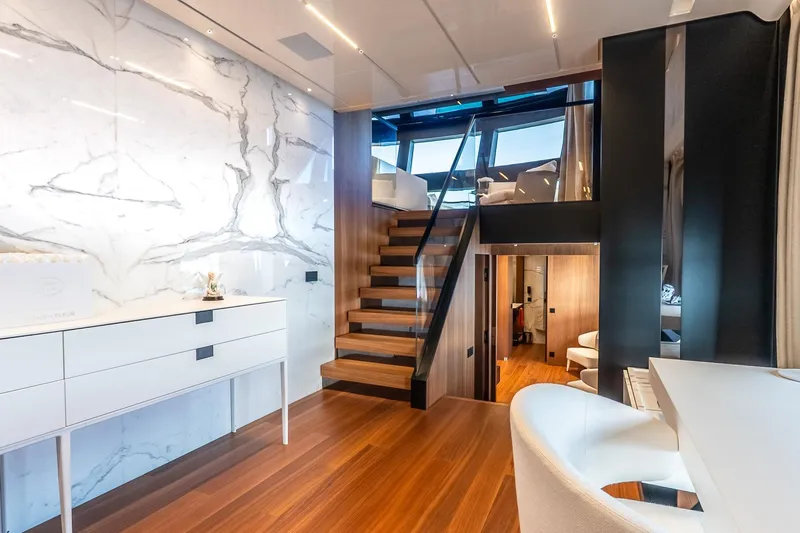 Neverland Yacht Photos Pics Luxurious interior of 2020 Sanlorenzo 44 Alloy yacht with modern design and elegant staircase.