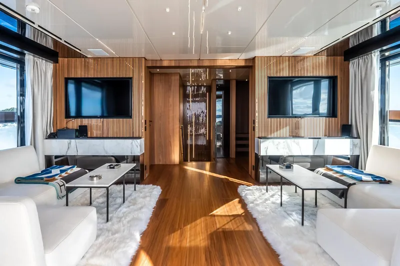 Neverland Yacht Photos Pics Luxurious interior of 2020 Sanlorenzo 44 Alloy yacht with modern decor and plush seating.
