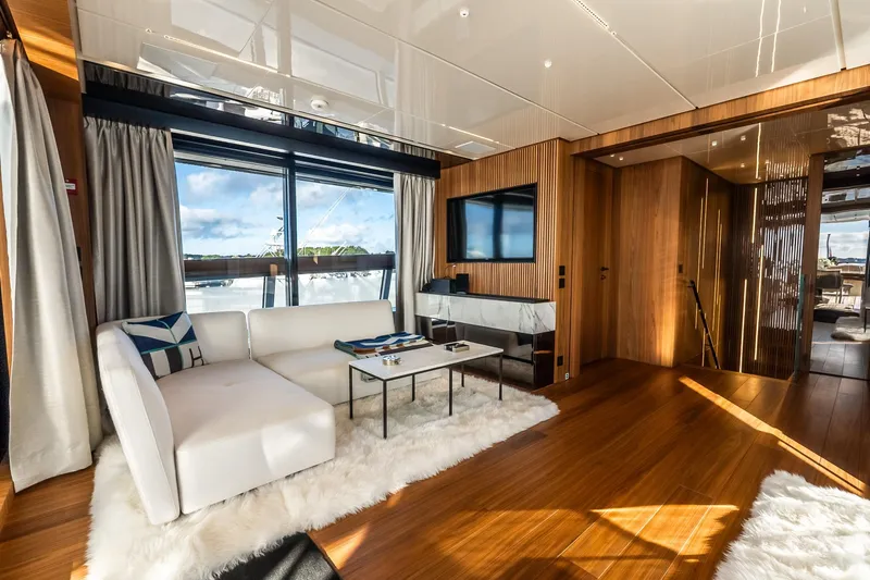 Neverland Yacht Photos Pics Luxurious interior of 2020 Sanlorenzo 44 Alloy yacht with modern decor and panoramic windows.