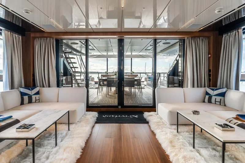 Neverland Yacht Photos Pics Luxurious interior of 2020 Sanlorenzo 44 Alloy yacht with elegant seating and modern decor.