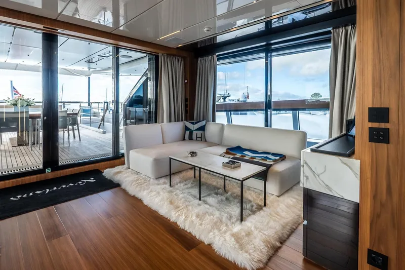 Neverland Yacht Photos Pics Luxurious interior of 2020 Sanlorenzo 44 Alloy yacht with modern decor and ocean view.