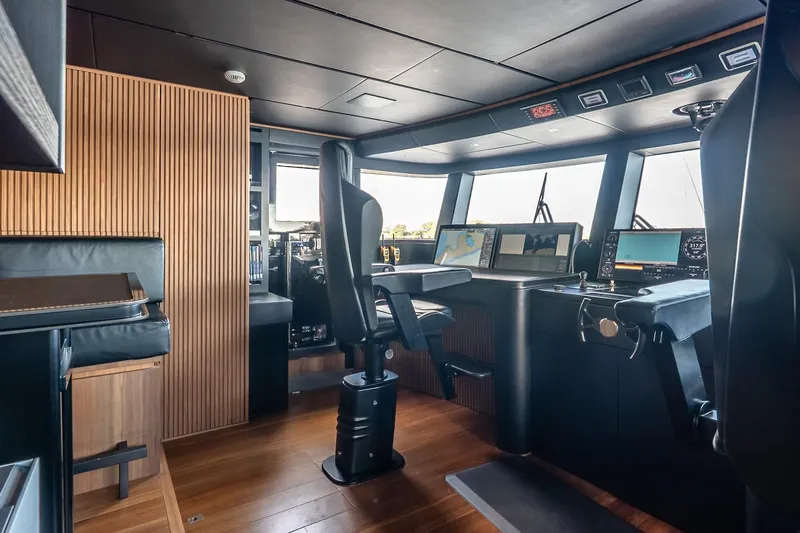 Neverland Yacht Photos Pics Luxurious helm of 2020 Sanlorenzo 44 Alloy yacht with modern navigation equipment.