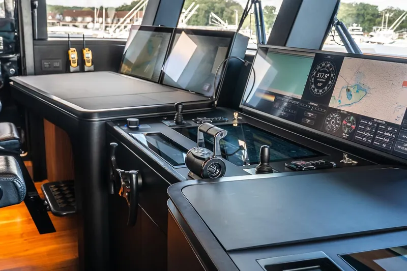 Neverland Yacht Photos Pics Modern helm station of 2020 Sanlorenzo 44 Alloy yacht with advanced navigation displays.