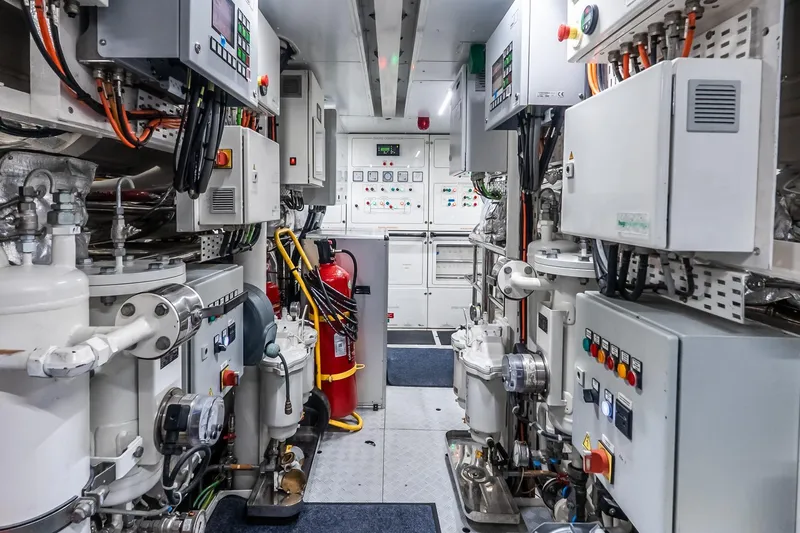 Neverland Yacht Photos Pics Engine room of 2020 Sanlorenzo 44 Alloy yacht, featuring advanced machinery and control panels.