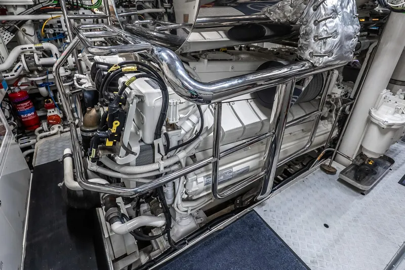 Neverland Yacht Photos Pics Engine room of 2020 Sanlorenzo 44 Alloy yacht, featuring complex machinery and piping.