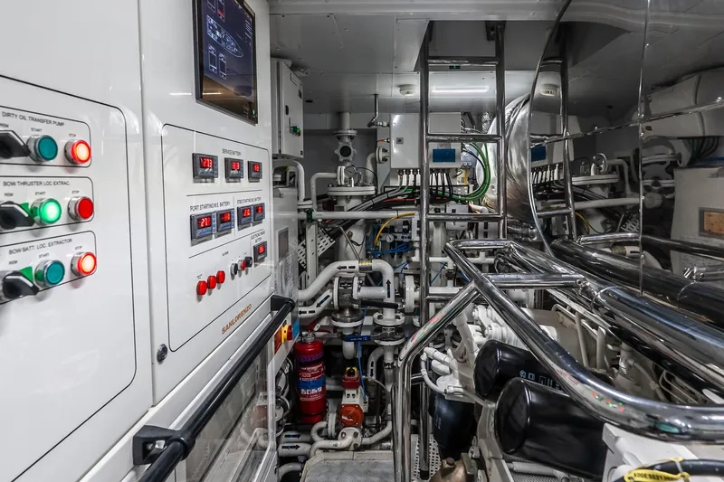 Neverland Yacht Photos Pics Engine room of 2020 Sanlorenzo 44 Alloy yacht with control panels and machinery.