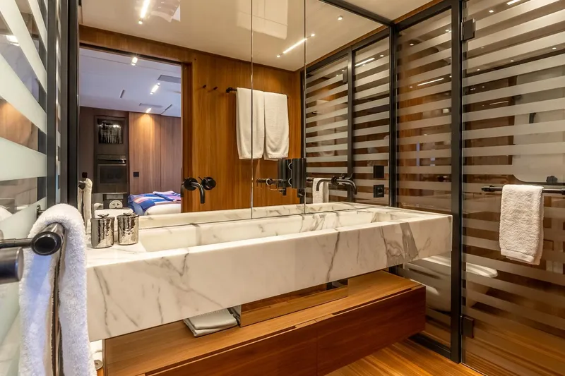 Neverland Yacht Photos Pics Luxurious bathroom in 2020 Sanlorenzo 44 Alloy yacht with marble sink and modern design.