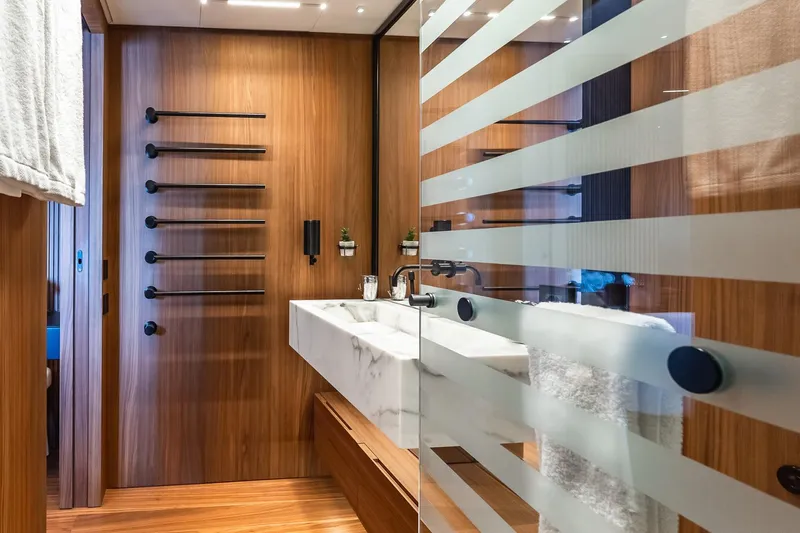 Neverland Yacht Photos Pics Luxurious bathroom on 2020 Sanlorenzo 44 Alloy yacht with modern wood and glass design.