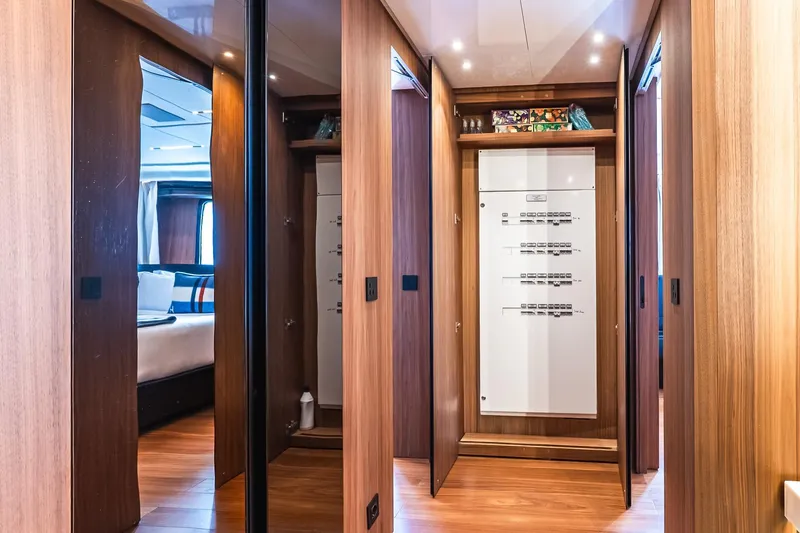 Neverland Yacht Photos Pics Luxurious interior of 2020 Sanlorenzo 44 Alloy yacht with wood paneling and modern design.