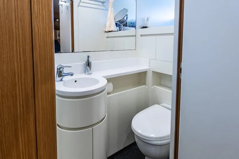Neverland Yacht Photos Pics Modern bathroom on 2020 Sanlorenzo 44 Alloy yacht, featuring sleek fixtures and minimalist design.