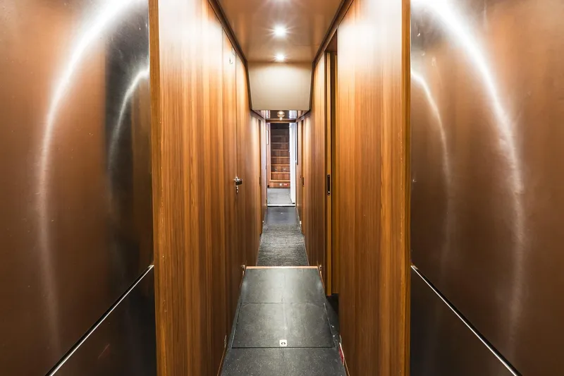 Neverland Yacht Photos Pics Hallway of 2020 Sanlorenzo 44 Alloy yacht with wooden paneling and modern design.