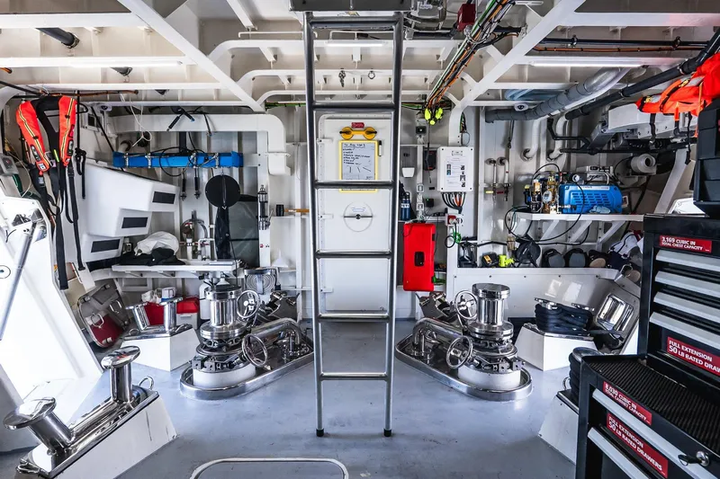 Neverland Yacht Photos Pics Engine room of 2020 Sanlorenzo 44 Alloy yacht, featuring equipment and safety gear.