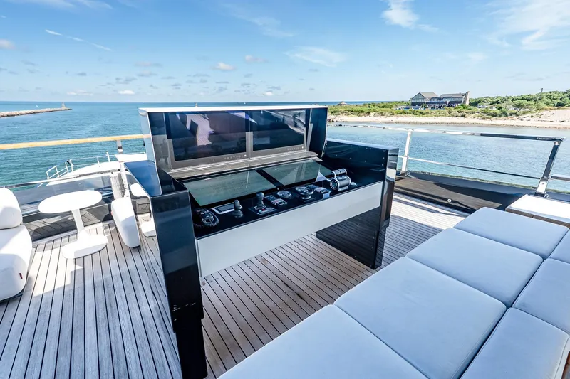 Neverland Yacht Photos Pics Luxurious 2020 Sanlorenzo 44 Alloy yacht deck with modern controls and ocean view.