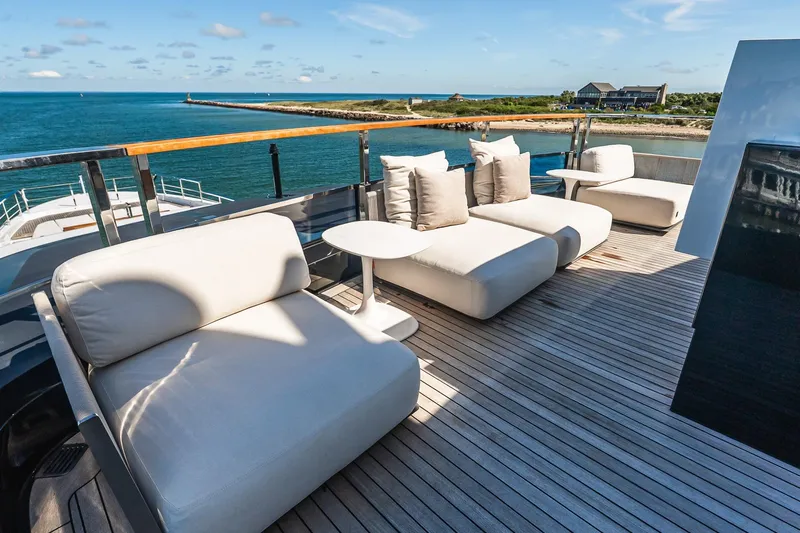Neverland Yacht Photos Pics Luxurious Sanlorenzo 44 Alloy yacht deck with plush seating, ocean view, 2020 model.