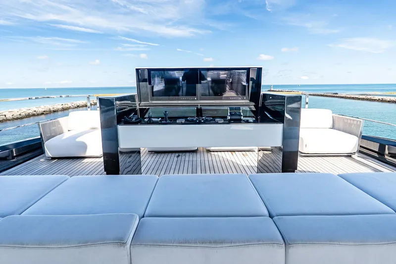 Neverland Yacht Photos Pics Luxurious 2020 Sanlorenzo 44 Alloy yacht deck with modern seating and ocean view.