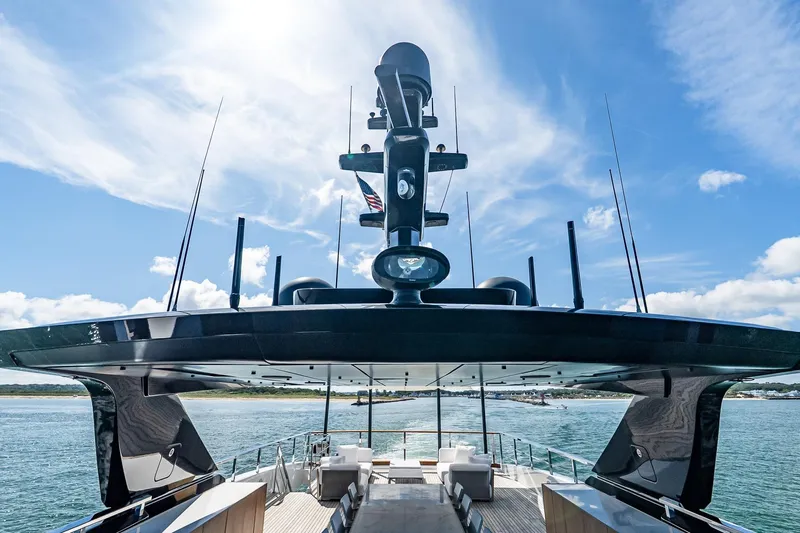 Neverland Yacht Photos Pics Sanlorenzo 44 Alloy yacht, 2020 model, with sleek design and open deck, under blue sky.