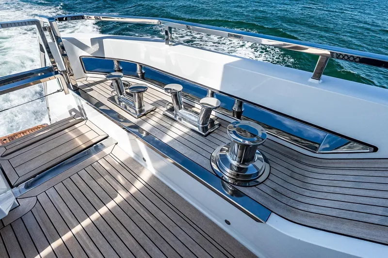 Neverland Yacht Photos Pics Sanlorenzo 44 Alloy yacht deck with polished cleats, 2020 model, cruising on open water.