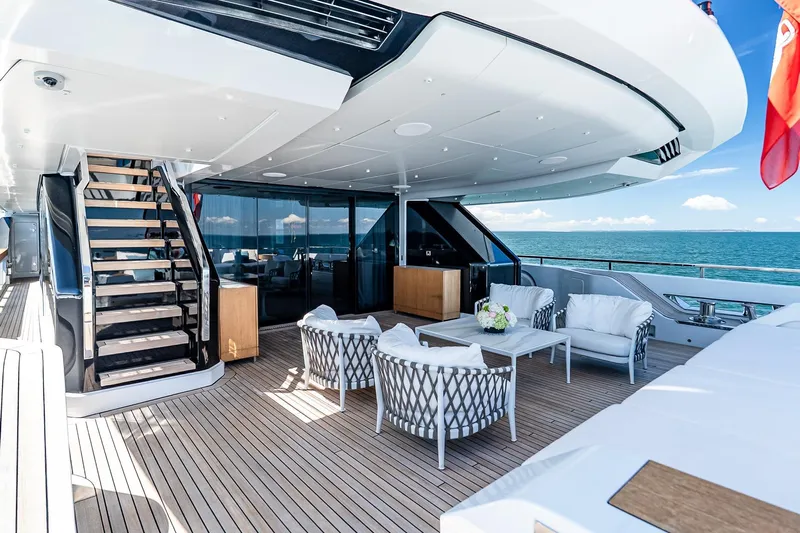 Neverland Yacht Photos Pics Luxurious 2020 Sanlorenzo 44 Alloy yacht deck with elegant seating and ocean view.