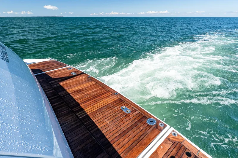 Neverland Yacht Photos Pics Sanlorenzo 44 Alloy yacht, 2020 model, cruising on open sea with wooden deck.