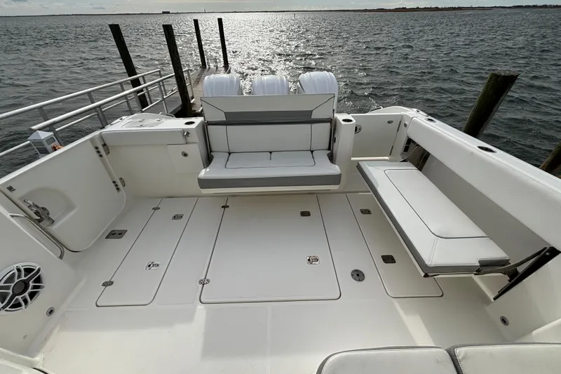  Yacht Photos Pics 2022 Pursuit DC 365 Dual Console boat with spacious seating and ocean view.