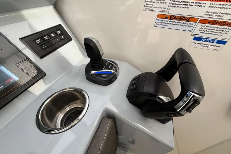  Yacht Photos Pics 2022 Pursuit DC 365 Dual Console boat controls with joystick and throttle.