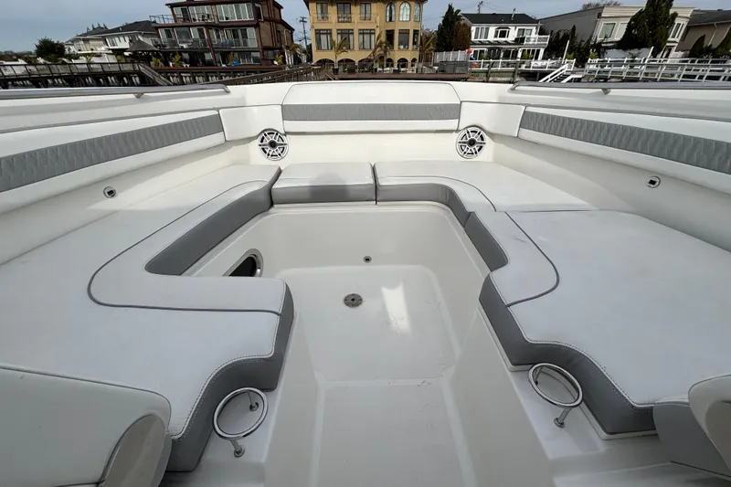  Yacht Photos Pics 2022 Pursuit DC 365 Dual Console boat interior with spacious seating and modern design.