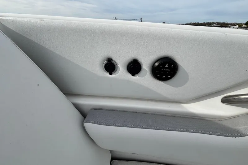  Yacht Photos Pics Interior view of 2022 Pursuit DC 365 Dual Console boat with control panel.