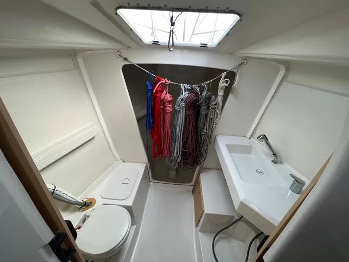 Yolo Yacht Photos Pics Interior of 2013 Jeanneau Sun Fast 3600 sailboat bathroom with ropes and sink.