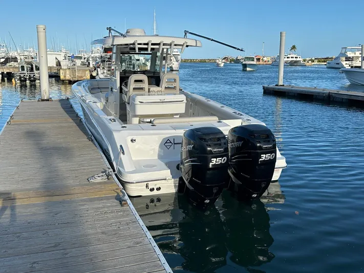  Yacht Photos Pics 2017 Boston Whaler 330 Outrage docked with twin Mercury 350 engines.