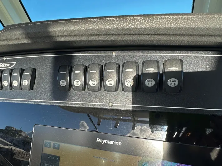  Yacht Photos Pics Control panel of a 2017 Boston Whaler 330 Outrage boat with Raymarine display.
