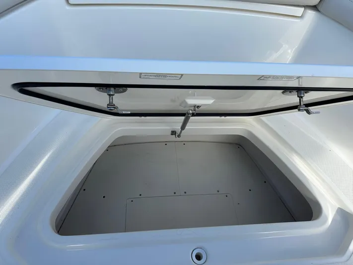  Yacht Photos Pics Open storage compartment on a 2017 Boston Whaler 330 Outrage boat.