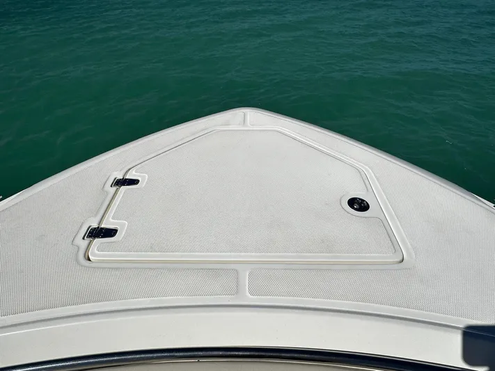  Yacht Photos Pics Bow of 2017 Boston Whaler 330 Outrage on calm water.