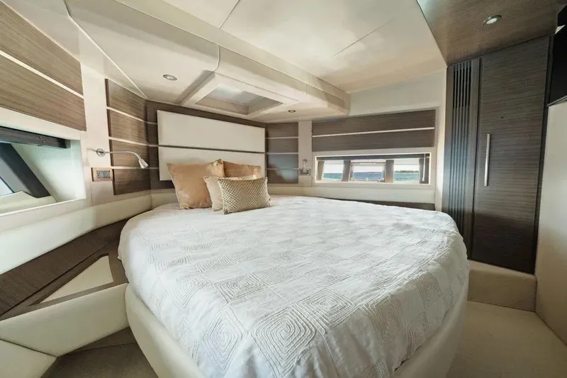 No Name Yacht Photos Pics Luxurious bedroom interior of 2017 Azimut Fly yacht with modern design and cozy bedding.