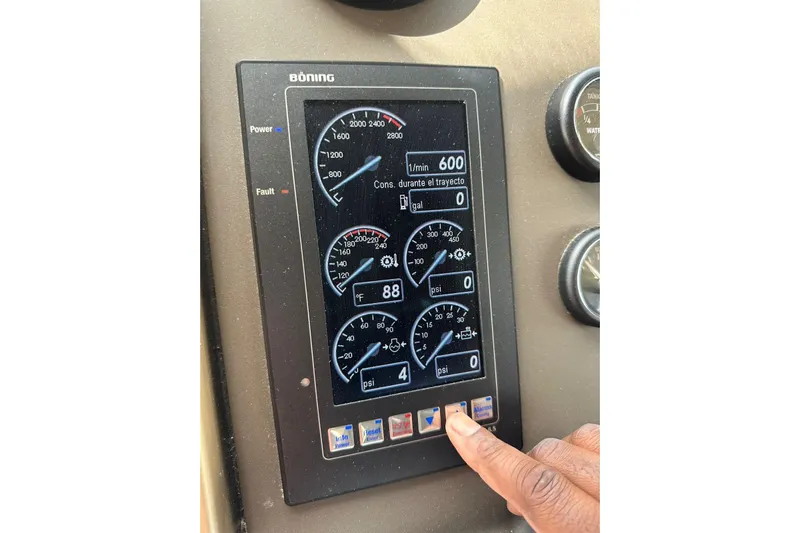 No Name Yacht Photos Pics Touchscreen control panel on a 2017 Azimut Fly yacht displaying engine metrics.