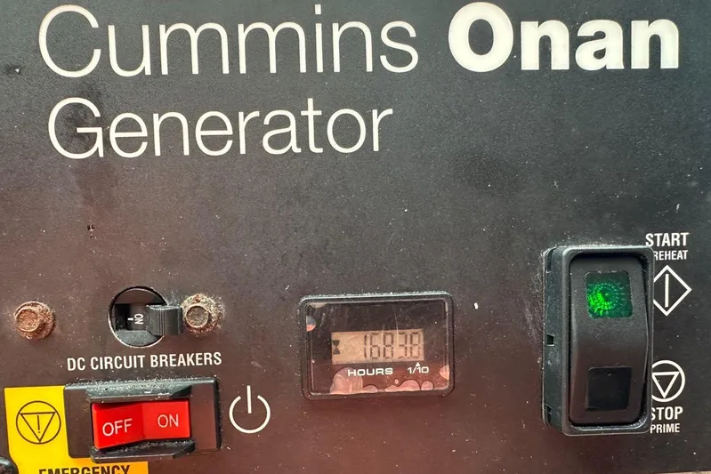 No Name Yacht Photos Pics Cummins Onan generator panel with hour meter reading 168.7 on Azimut Fly 2017 yacht.