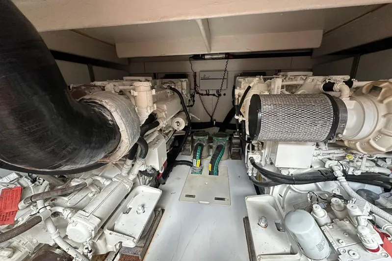 No Name Yacht Photos Pics Engine room of 2017 Azimut Fly yacht, showcasing dual engines and mechanical components.