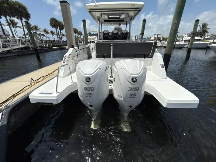  Yacht Photos Pics 2022 Jeanneau Leader 10.5 WA Series 2 with twin Yamaha 300 V6 engines docked at marina.