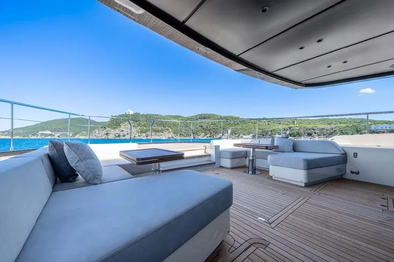 Acali Yacht Photos Pics Luxurious 2024 Widercat92 yacht deck with elegant seating and scenic ocean view.