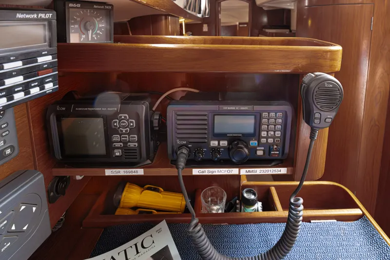  Yacht Photos Pics Navigation equipment on a 1999 Beneteau Oceanis 44 CC yacht, featuring communication devices.