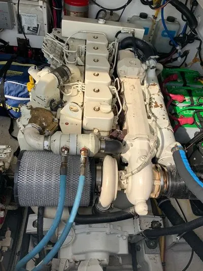 Vixen Yacht Photos Pics Engine room of a 2002 Tiara Yachts 3500 Open with visible engine.