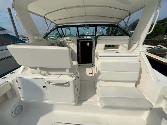 Vixen Yacht Photos Pics Interior of a 2002 Tiara Yachts 3500 Open with white seating.
