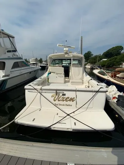Vixen Yacht Photos Pics 2002 Tiara Yachts 3500 Open docked, rear view.