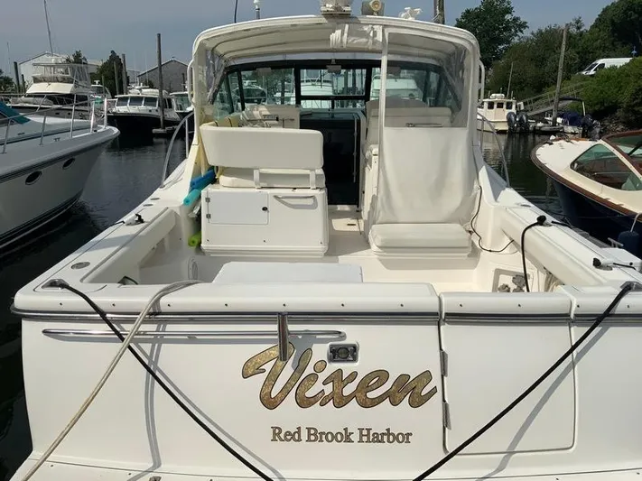 Vixen Yacht Photos Pics 2002 Tiara Yachts 3500 Open at harbor, rear view of boat.