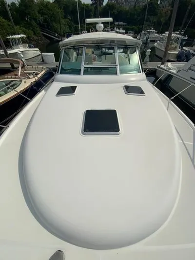 Vixen Yacht Photos Pics 2002 Tiara Yachts 3500 Open docked at marina.