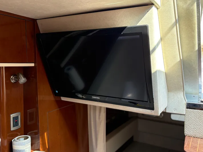  Yacht Photos Pics Flat-screen TV inside 2012 Sea Ray 350 Sundancer yacht cabin.
