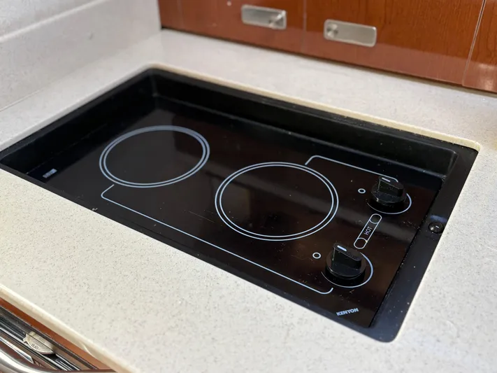  Yacht Photos Pics Stovetop in 2012 Sea Ray 350 Sundancer yacht kitchen.