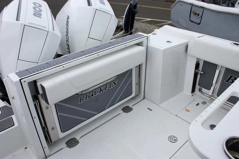 Irish Eyes Yacht Photos Pics 2023 Blackfin 252 CC boat interior with seating and outboard engines.