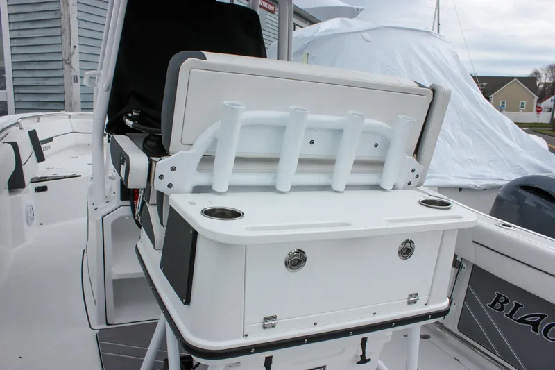 Irish Eyes Yacht Photos Pics 2023 Blackfin 252 CC boat interior with rod holders and storage compartments.