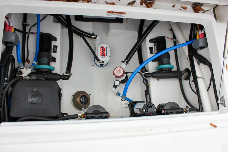 Irish Eyes Yacht Photos Pics 2023 Blackfin 252 CC boat engine compartment with wiring and components.