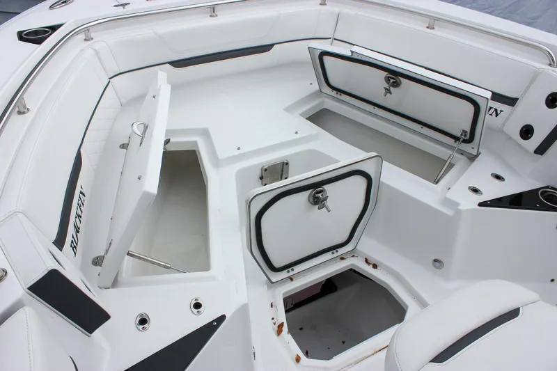 Irish Eyes Yacht Photos Pics 2023 Blackfin 252 CC boat interior with open storage compartments.